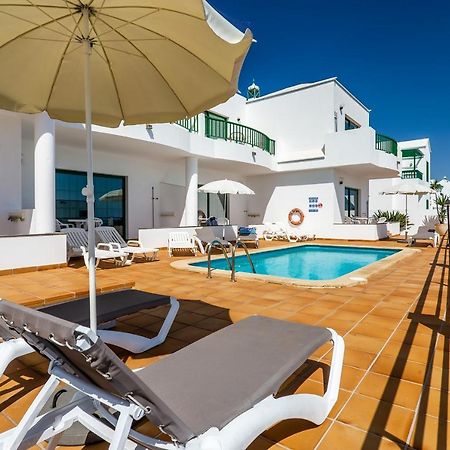 Apartamentos Los Quiqueres プエルト・デル・カルメン エクステリア 写真