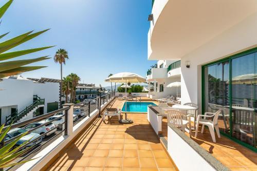 Apartamentos Los Quiqueres プエルト・デル・カルメン エクステリア 写真