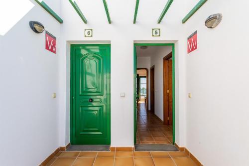 Apartamentos Los Quiqueres プエルト・デル・カルメン エクステリア 写真