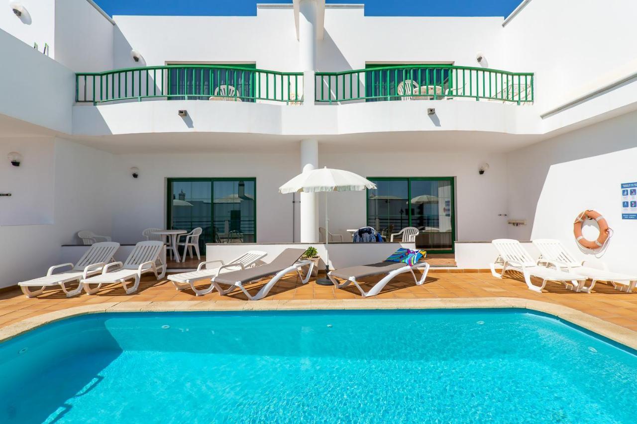 Apartamentos Los Quiqueres プエルト・デル・カルメン エクステリア 写真